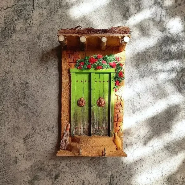 Wooden Key Holder With a Mud House Design 20cm