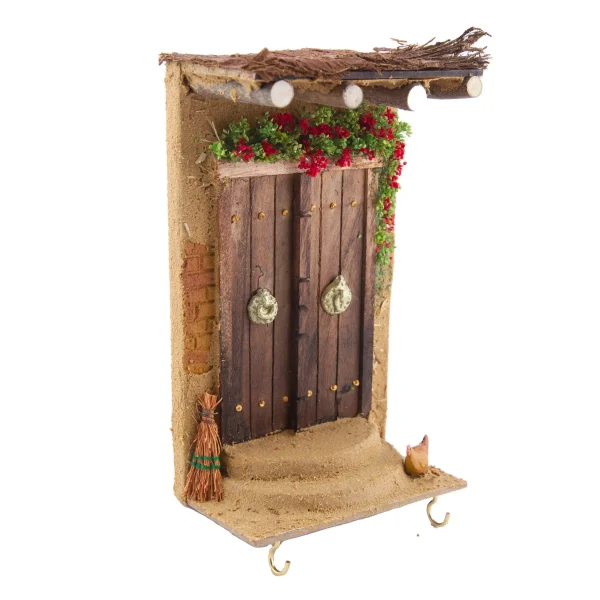 Wooden Key Holder With a Mud House Design 20cm