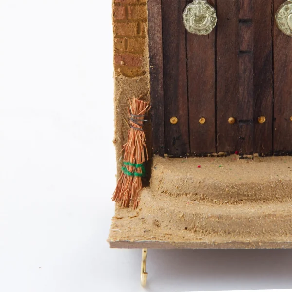 Wooden Key Holder With a Mud House Design 20cm