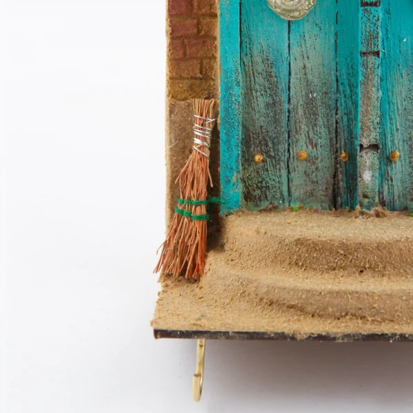 Wooden Key Holder With a Mud House Design 20cm